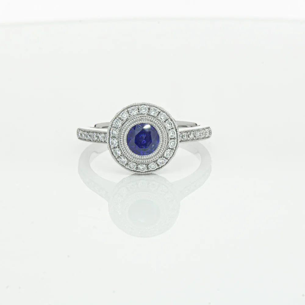 Platinum .65ct Sapphire & Diamond Halo Ring