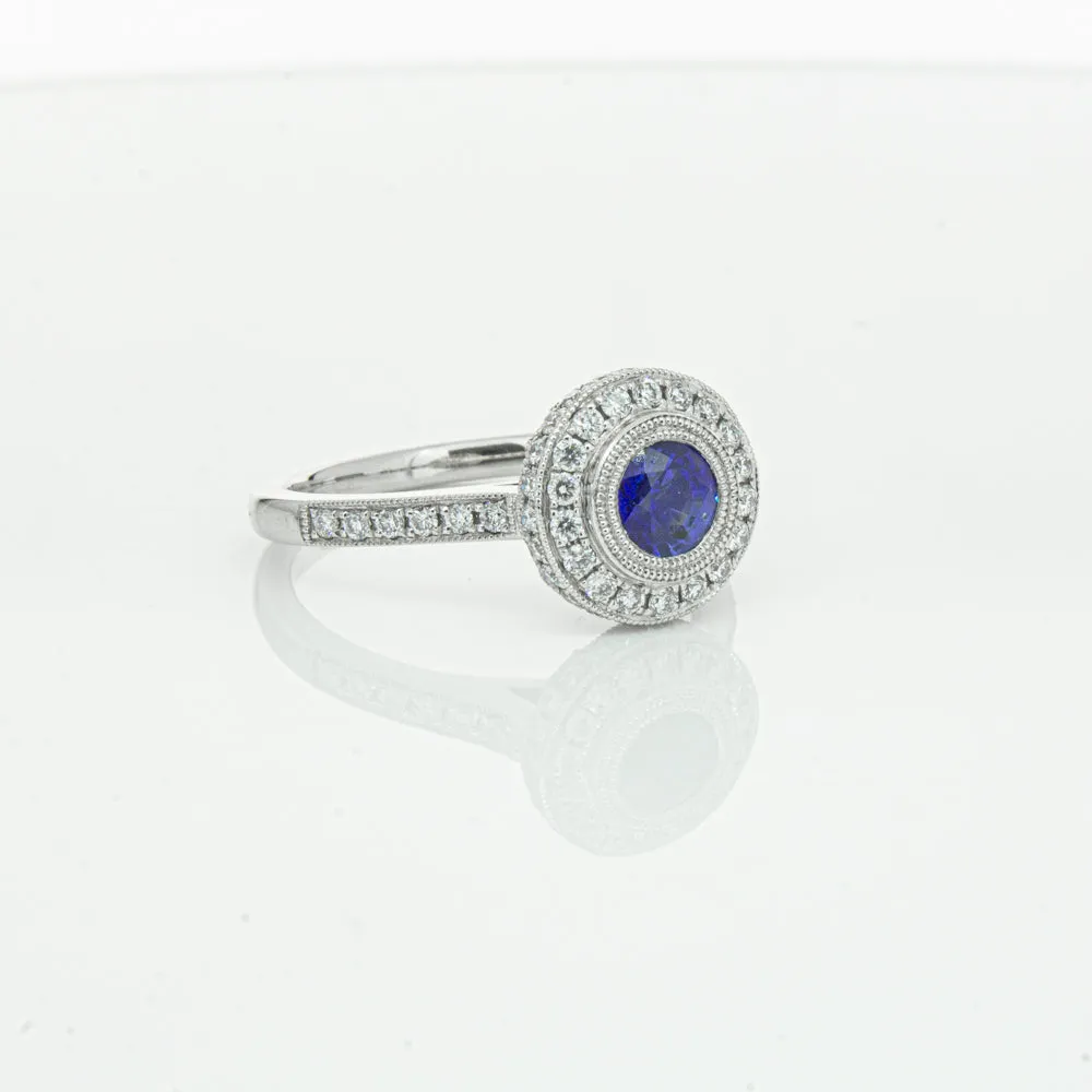 Platinum .65ct Sapphire & Diamond Halo Ring