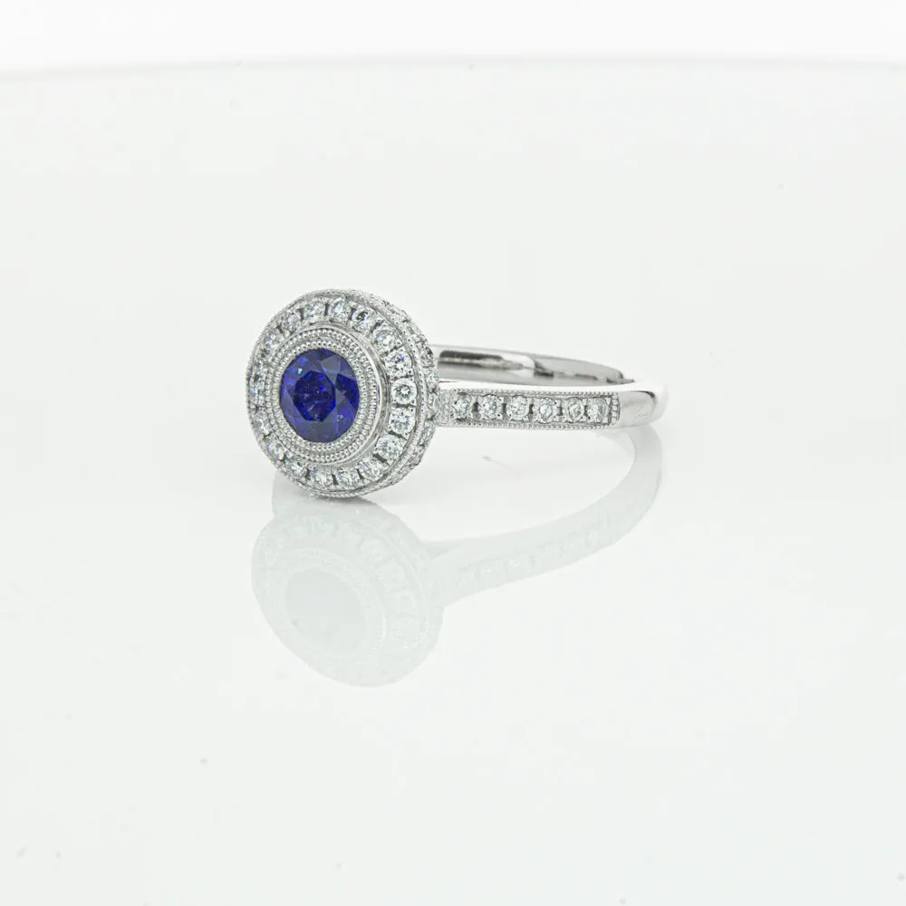 Platinum .65ct Sapphire & Diamond Halo Ring