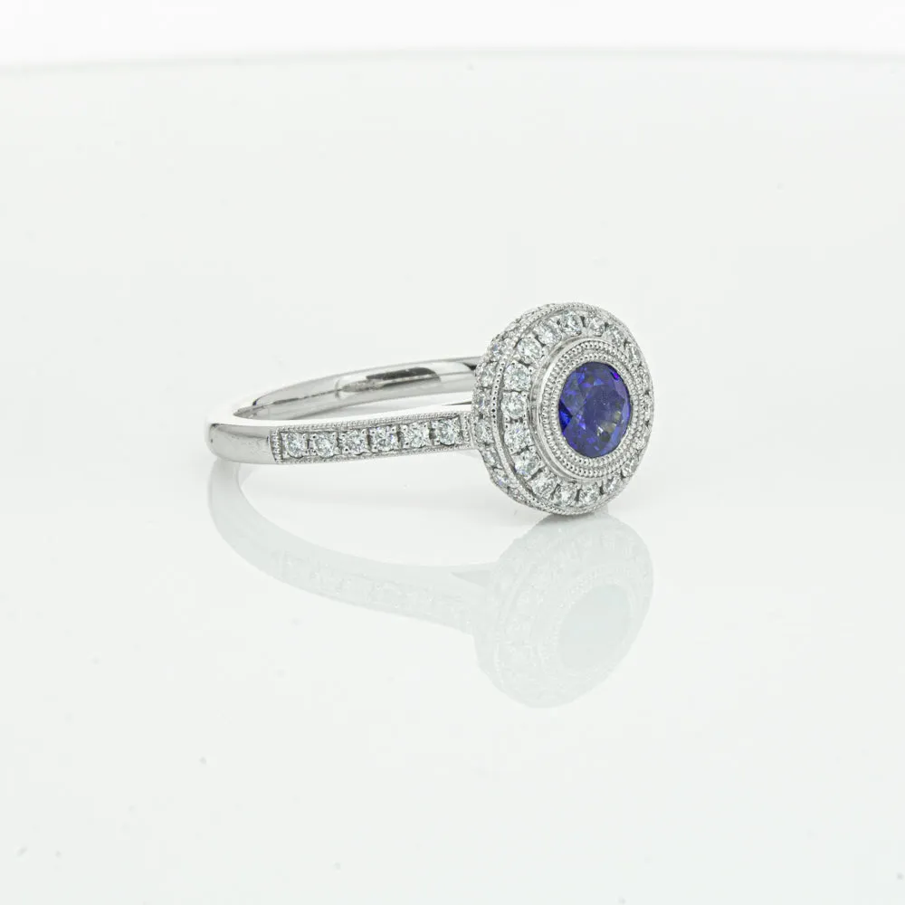 Platinum .65ct Sapphire & Diamond Halo Ring