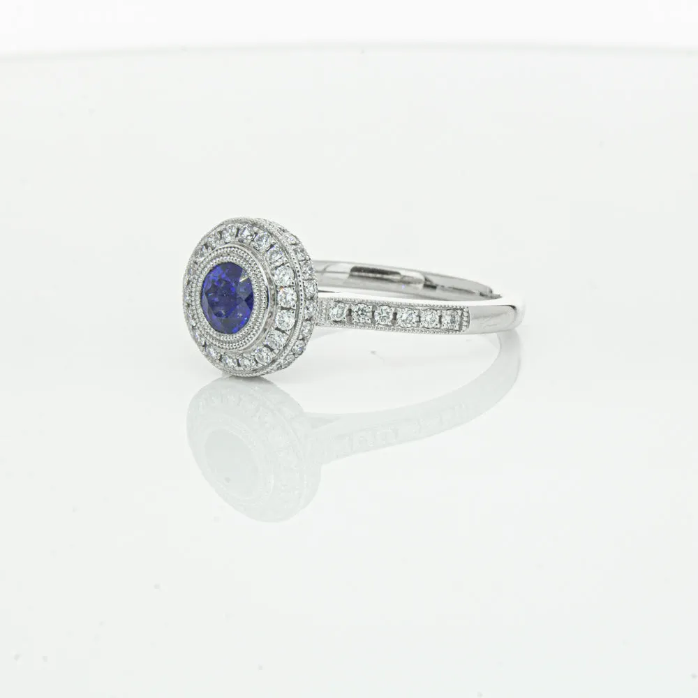 Platinum .65ct Sapphire & Diamond Halo Ring