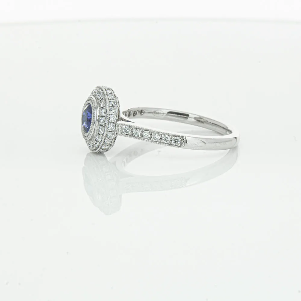 Platinum .65ct Sapphire & Diamond Halo Ring