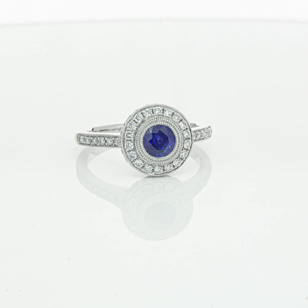 Platinum .65ct Sapphire & Diamond Halo Ring