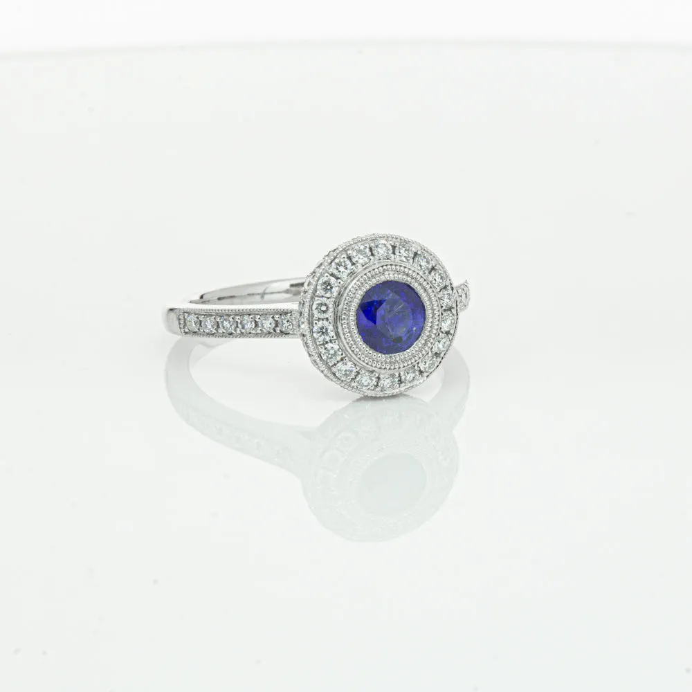 Platinum .65ct Sapphire & Diamond Halo Ring