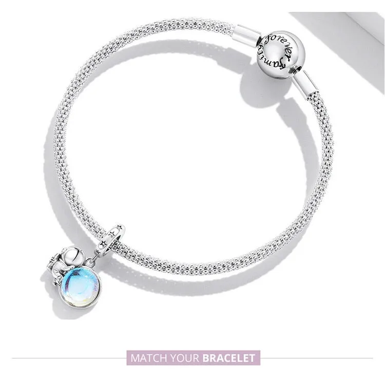 The Moon & Astronaut Rainbow Moonstone Charm Pendant